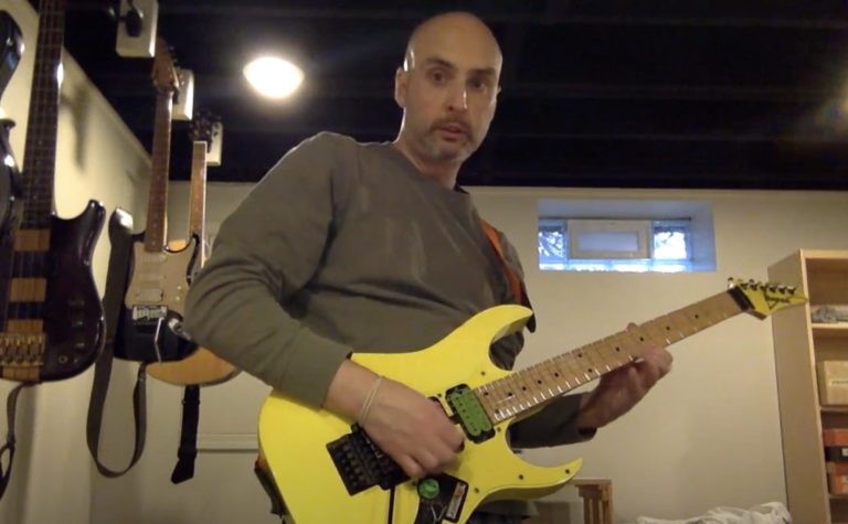 Frank playing yellow Ibanez RG550 circa 2016